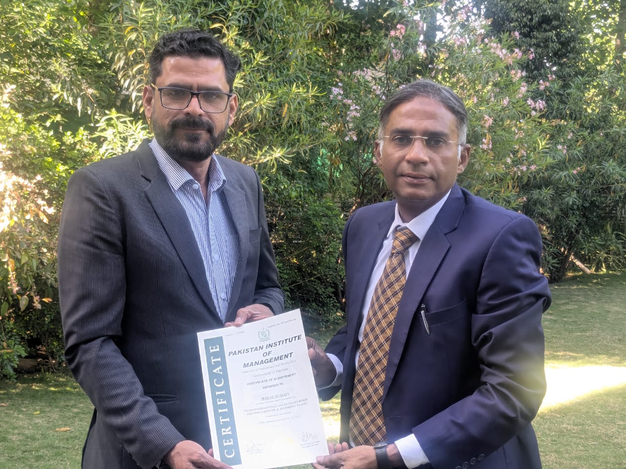 PIM certificate presentation ceremony with Zulfiqar Ali Qureshi